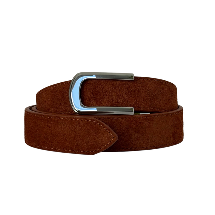 A brown suede belt with a polished silver-tone metal buckle, neatly coiled on a solid white background.