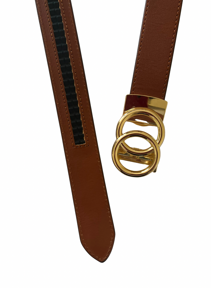 leather belt strap with ratchet track on the back in tan colour with gold double ring buckle on a white background